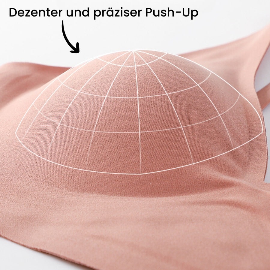 Das Bild zeigt den Bereich des Cups eines Umstandsmode-BHs, der einen dezenten und präzisen Push-Up-Effekt bietet. Der BH ist so konstruiert, dass er das Dekolleté sanft anhebt und formt, ohne unangenehm aufzutragen. Der Push-Up-Effekt ist subtil und sorgt für eine natürliche, angenehme Form. Der BH ist aus einem weichen, elastischen Material gefertigt, das sich perfekt anpasst und gleichzeitig den nötigen Halt gibt. Die genaue Struktur des Push-Ups wird durch das Gittermuster im Bild verdeutlicht, das die 